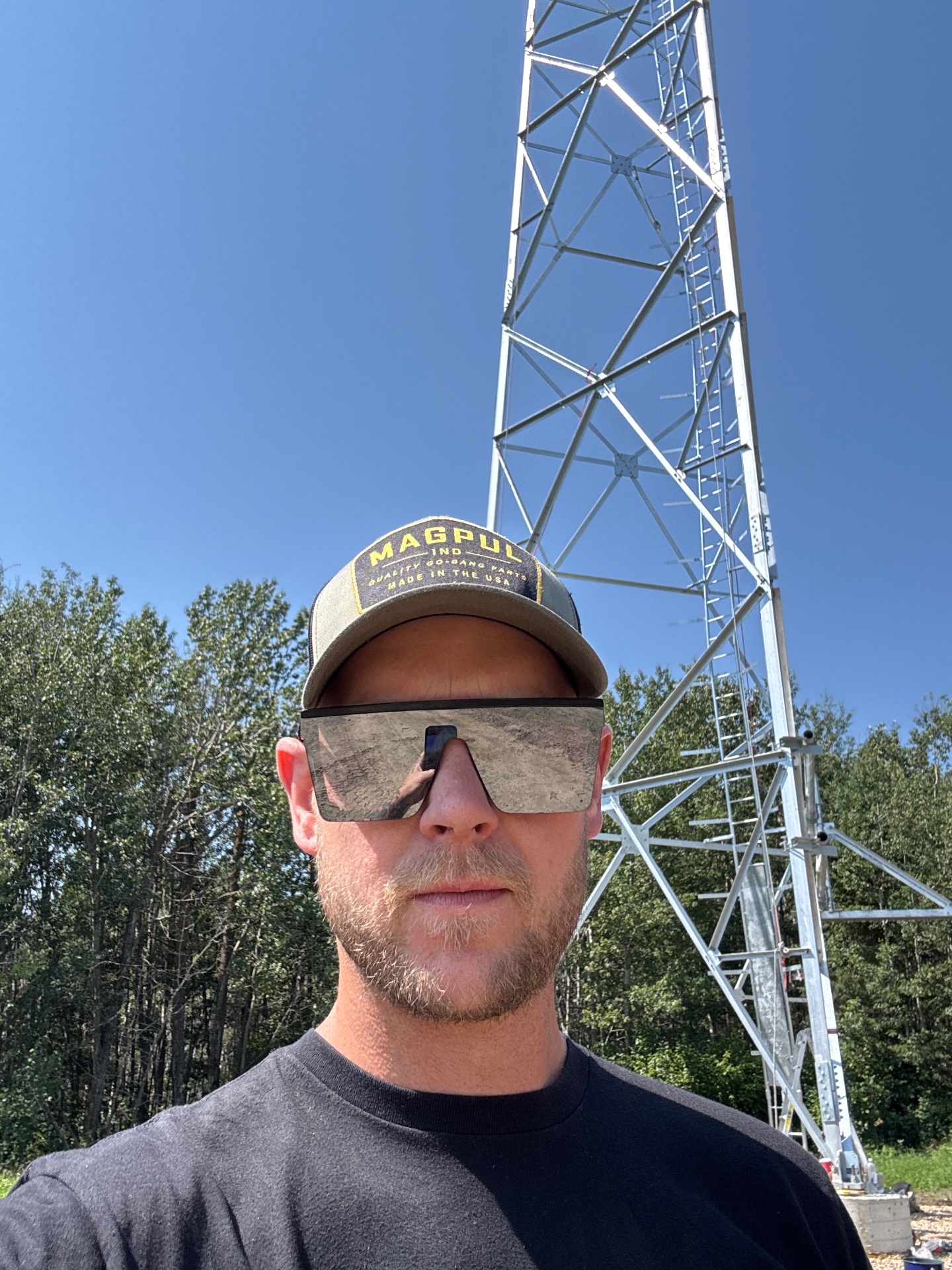 Founder and CEO of Day Dynamic Consulting on-site at a telecom tower build in Alberta
